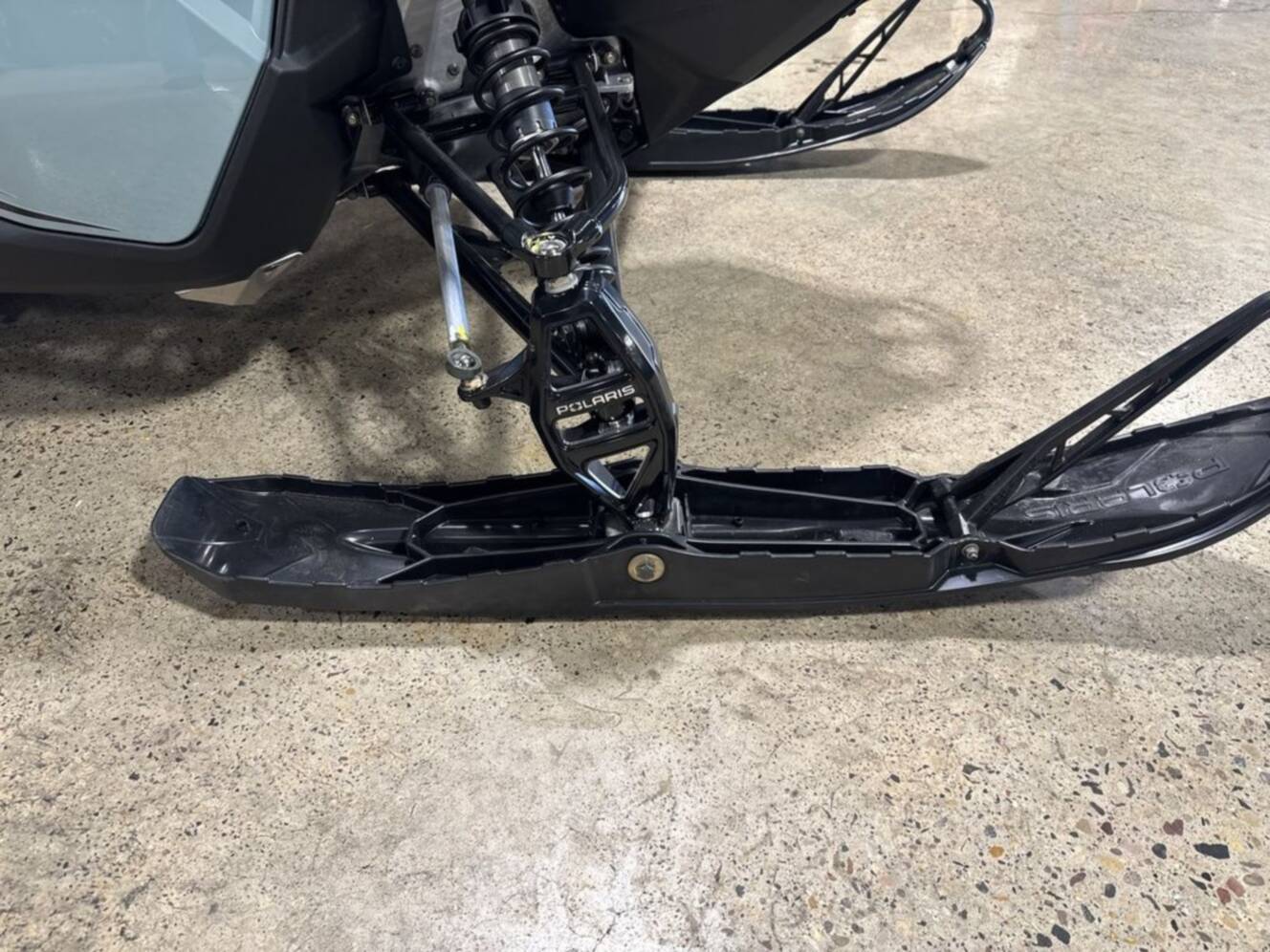 A photo of this 2026 Polaris® 650 INDY XC 137 Gloss Black / Blue Dusk