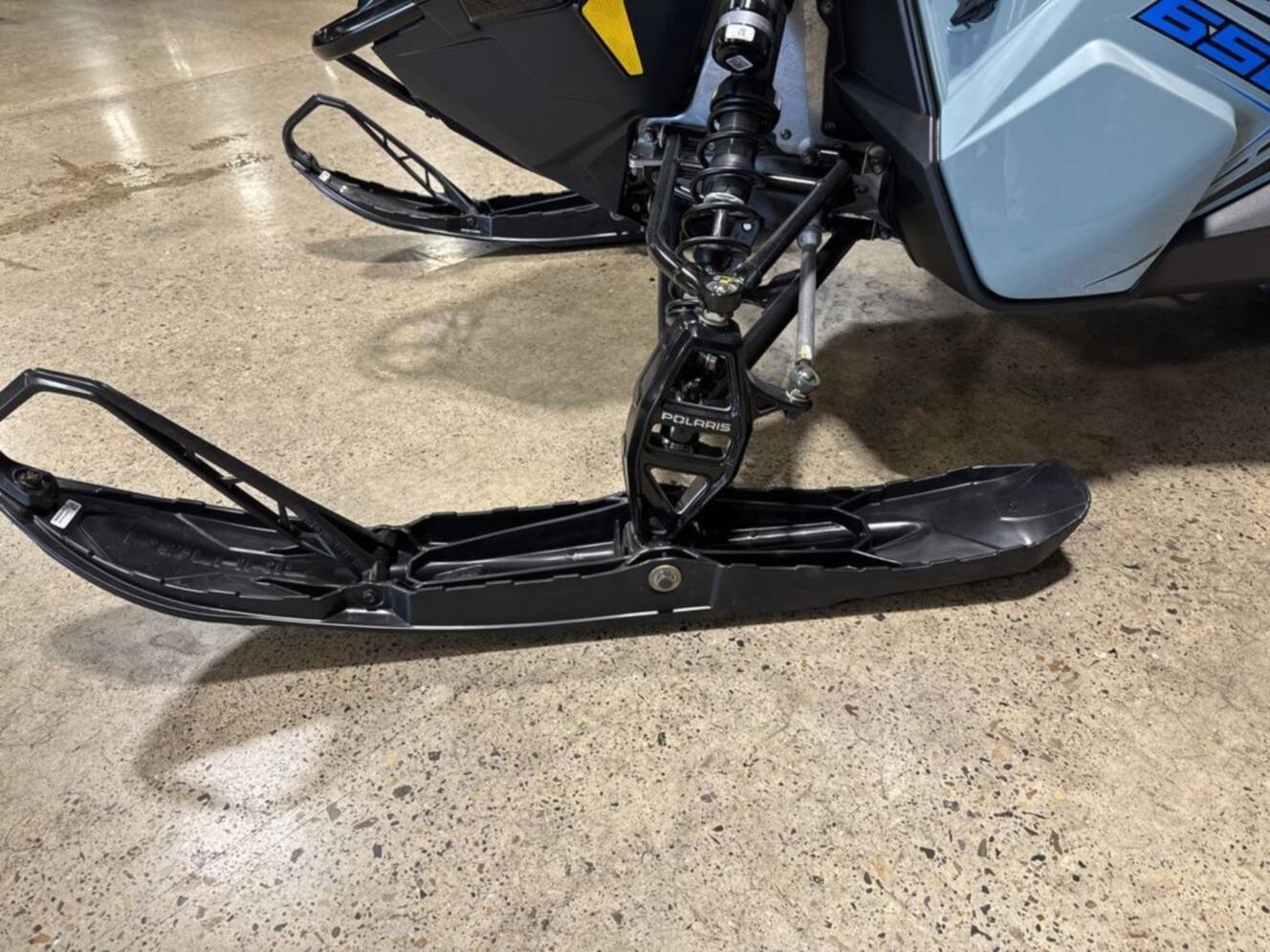 A photo of this 2026 Polaris® 650 INDY XC 137 Gloss Black / Blue Dusk