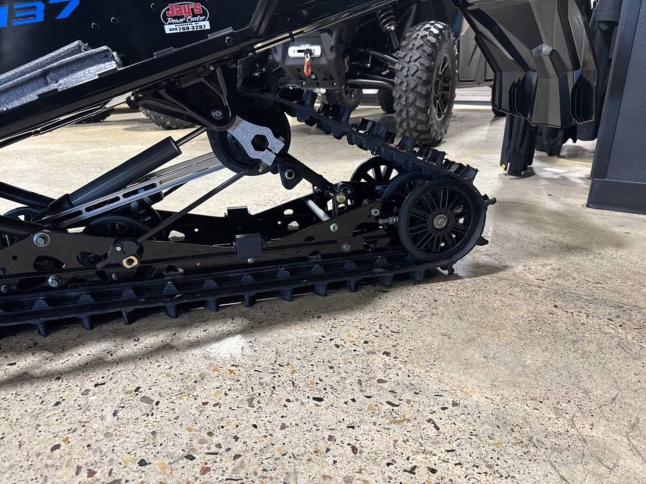 A photo of this 2026 Polaris® 650 INDY XC 137 Gloss Black / Blue Dusk