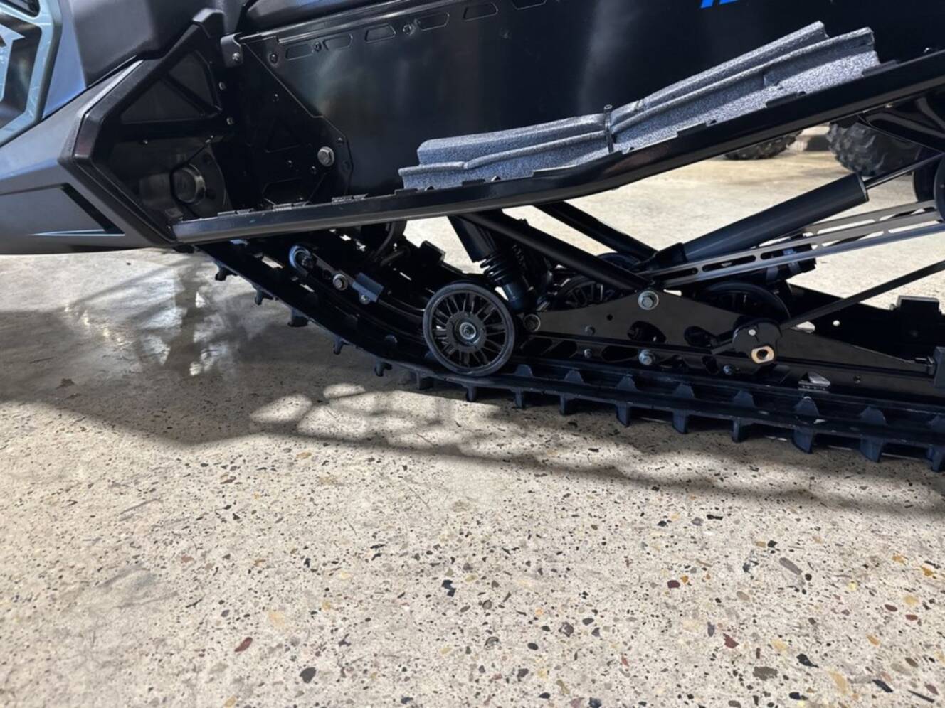 A photo of this 2026 Polaris® 650 INDY XC 137 Gloss Black / Blue Dusk