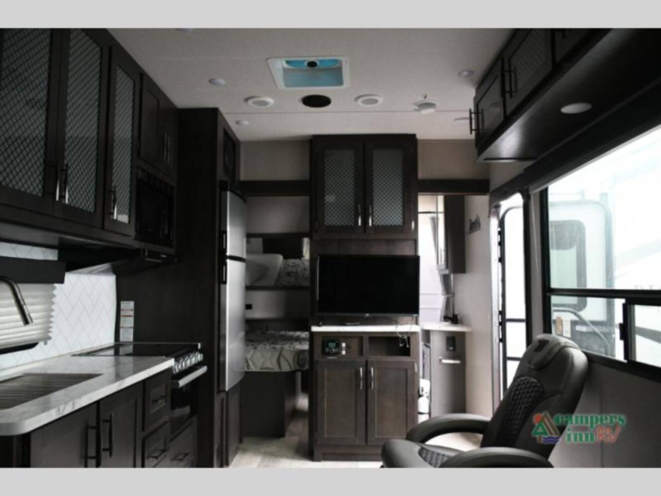 A photo of this 2023 Grand Design Momentum 21G