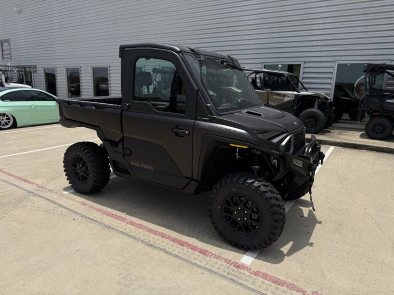 A photo of this 2026 Polaris RGR XD 1500 NS ULTIMATE SUPER GRAPHITE