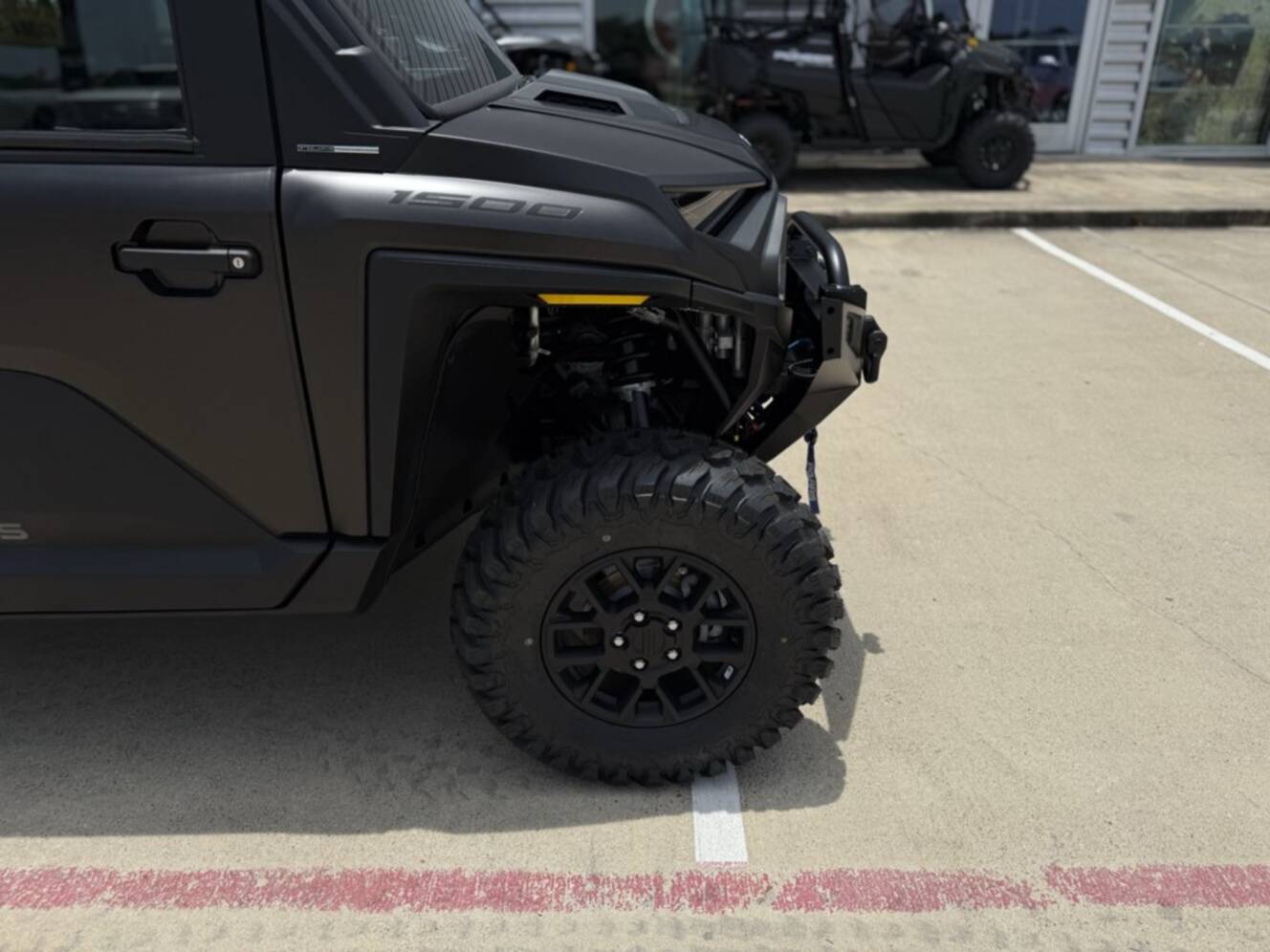 A photo of this 2026 Polaris RGR XD 1500 NS ULTIMATE SUPER GRAPHITE