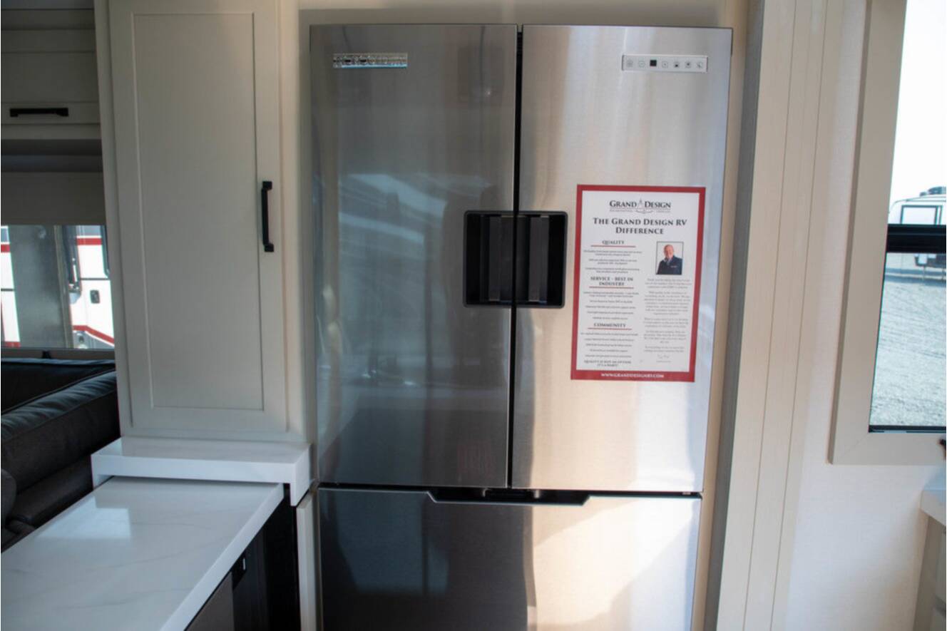 A photo of this 2026 Grand Design MOMENTUM 395MS