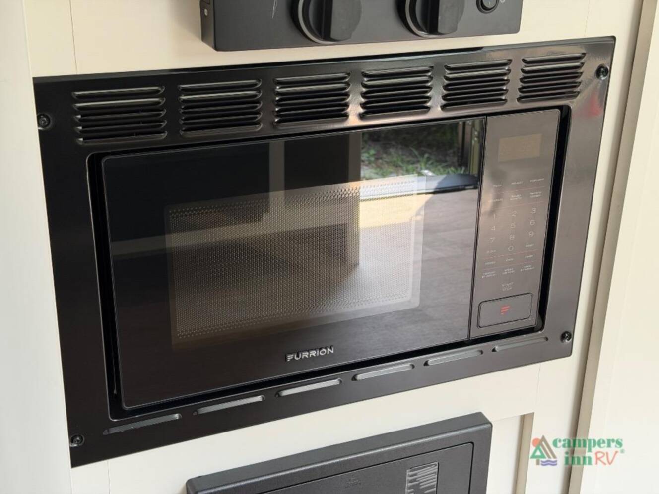 A photo of this 2027 Grand Design Transcend Lite 121RBL
