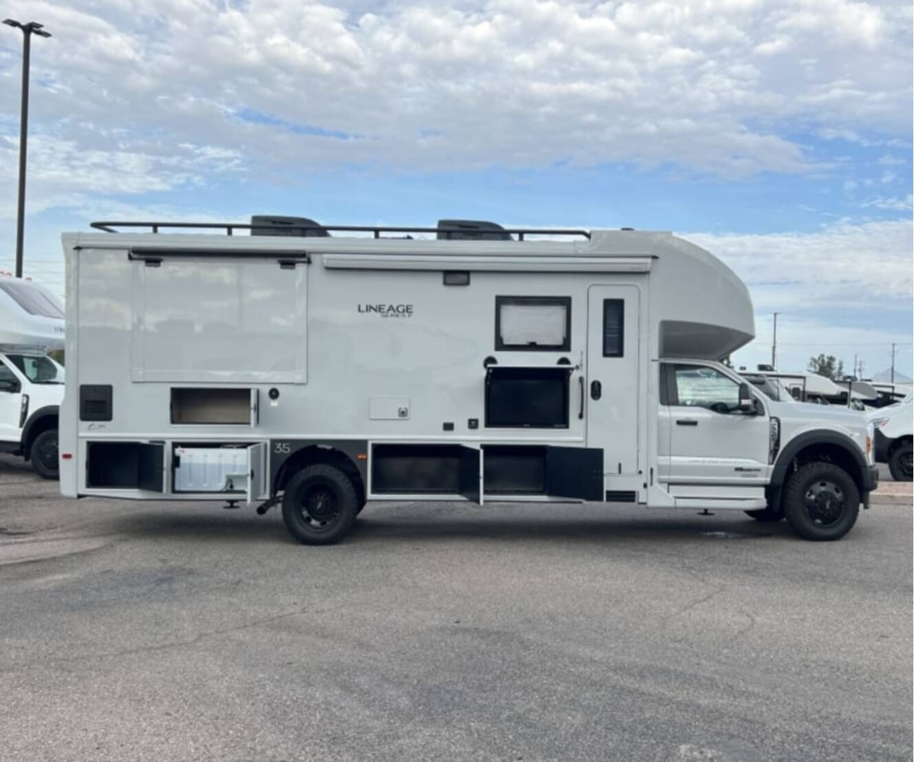 A photo of this 2026 Grand Design LINEAGE SERIES F 31ZW5-FBP