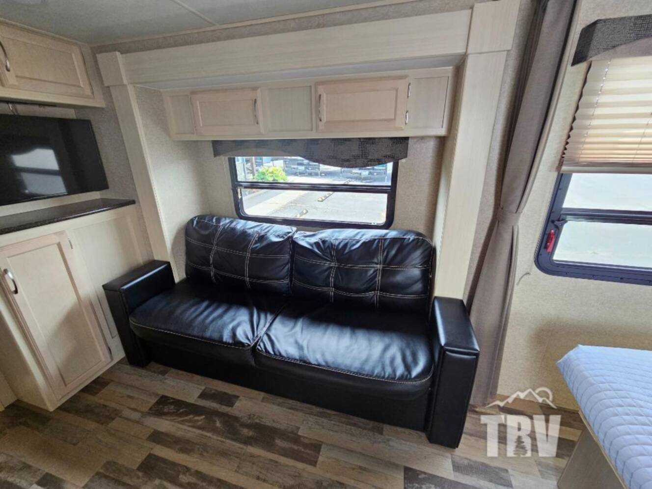 A photo of this 2018 Winnebago Industries Towables Micro Minnie 2106FBS