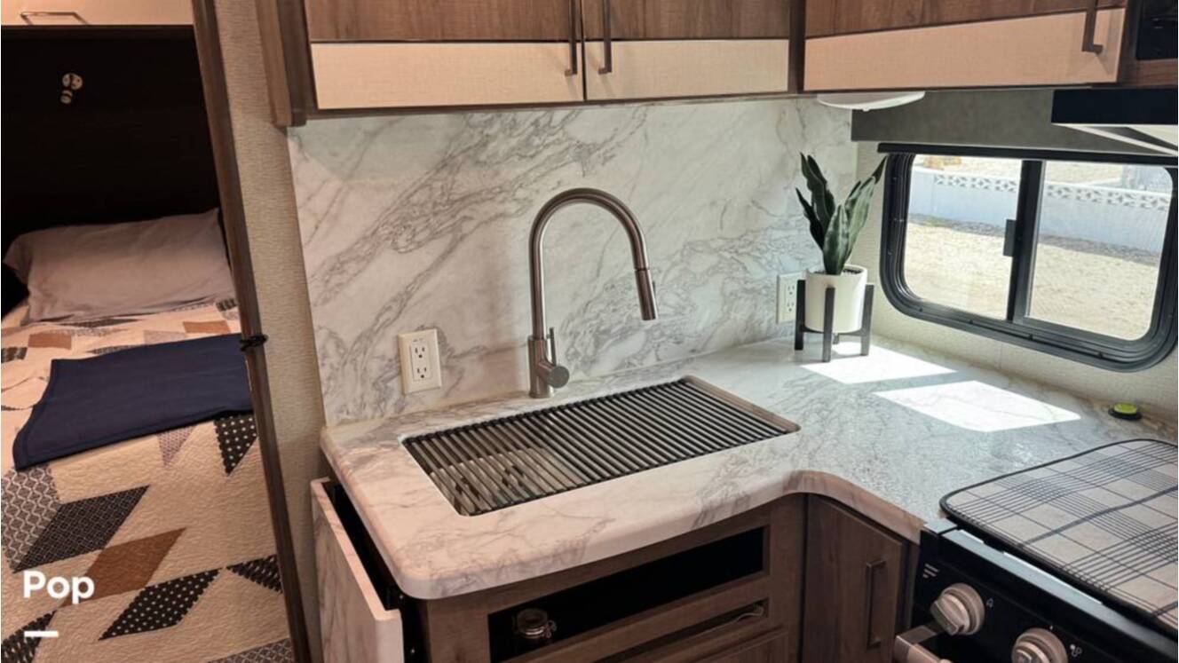 A photo of this 2022 Grand Design Imagine 2400BH