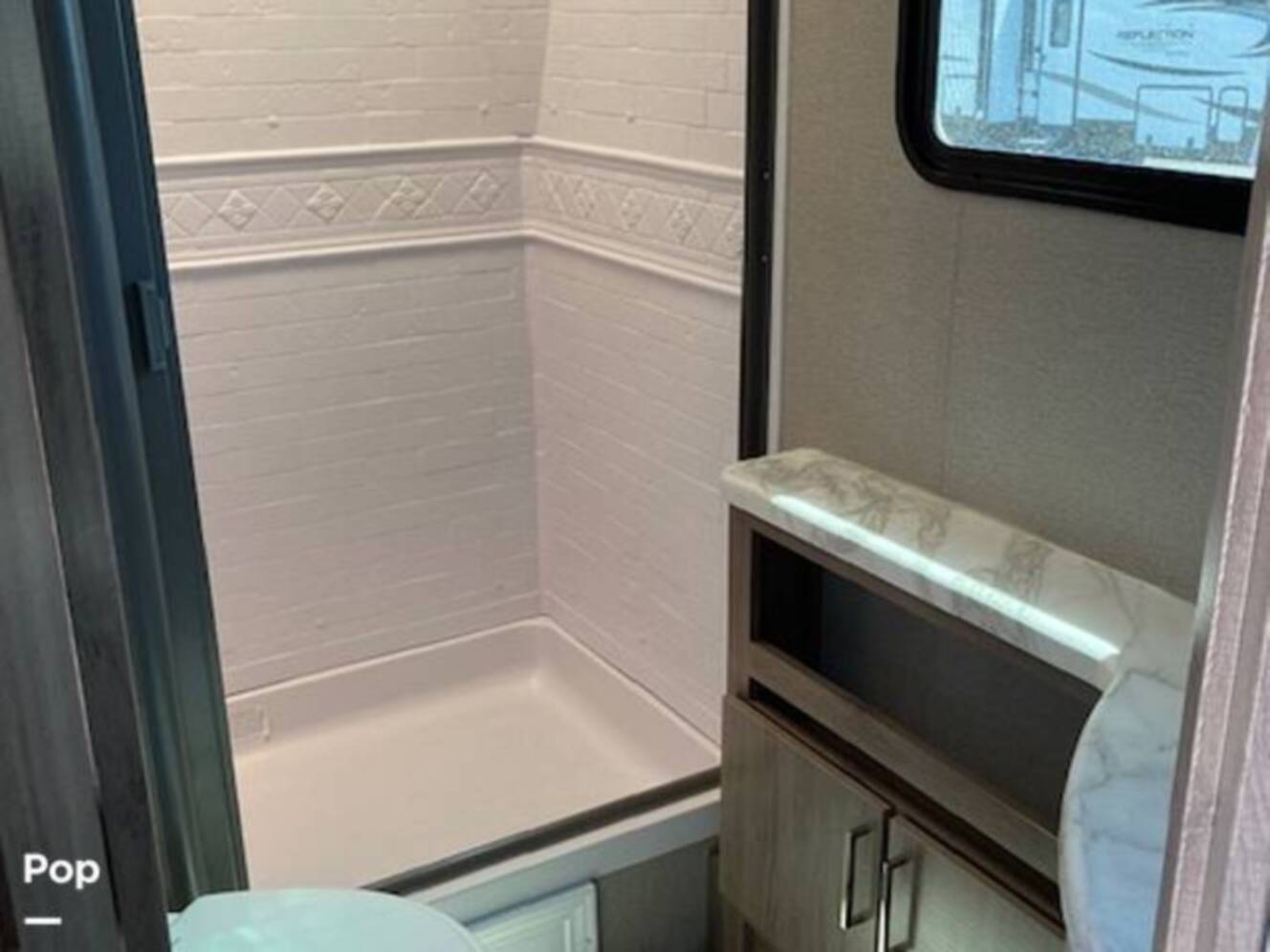 A photo of this 2022 Grand Design Imagine 2400BH