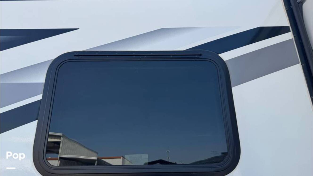 A photo of this 2022 Grand Design Imagine 2400BH