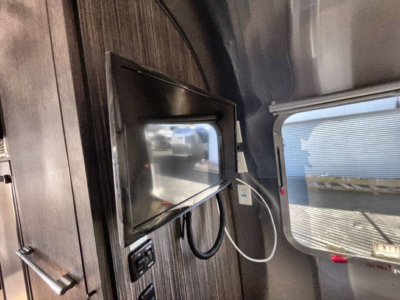 A photo of this 2016 Airstream International Serenity 23FB (Front Queen Bed)