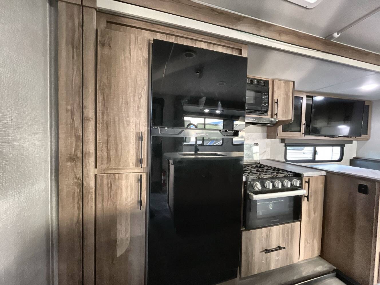 A photo of this 2024 Grand Design IMAGINE 3210BH