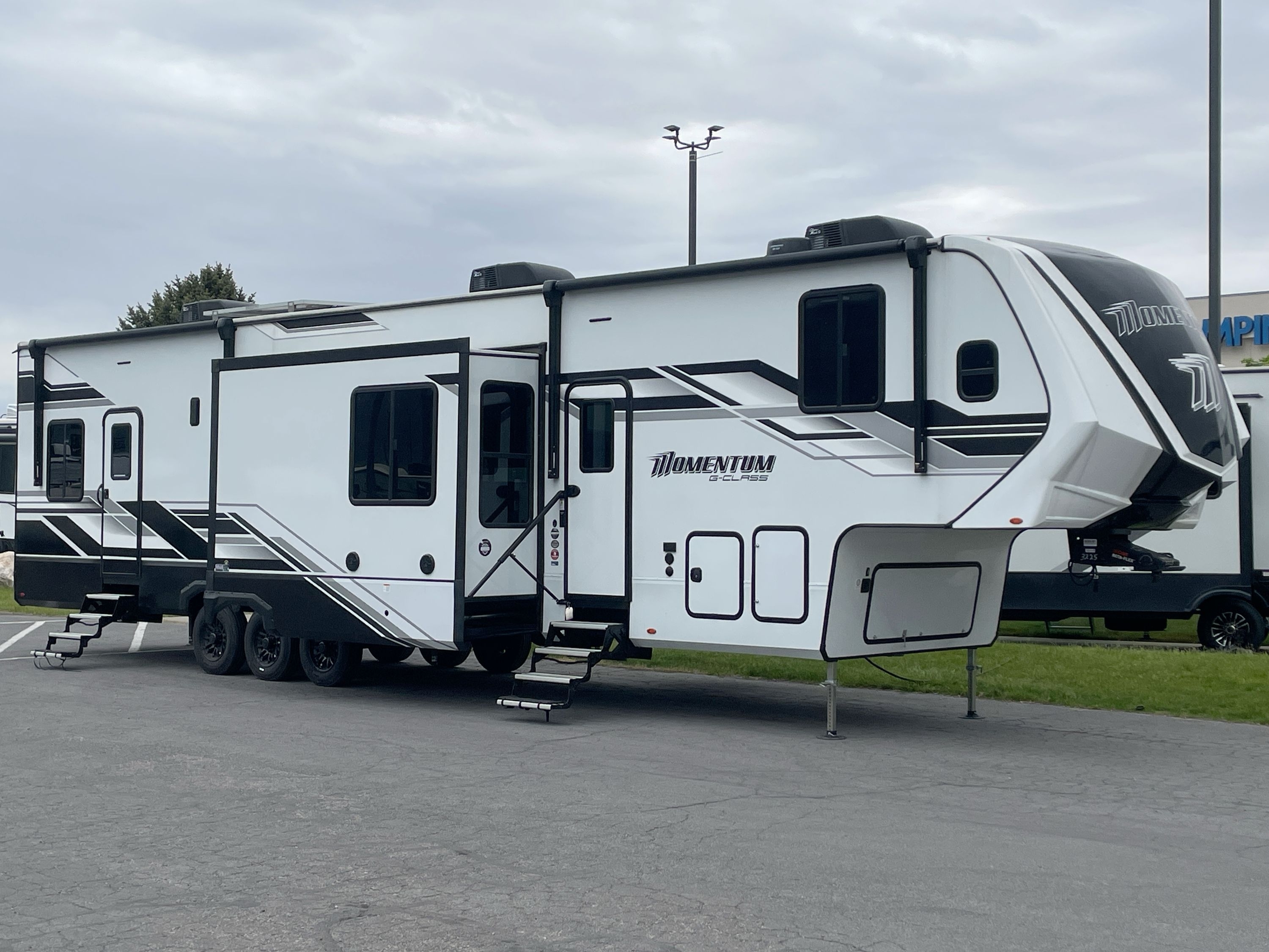 2025 Grand Design MOMENTUM G CLASS 415G Fifth Wheel Toy Hauler RV