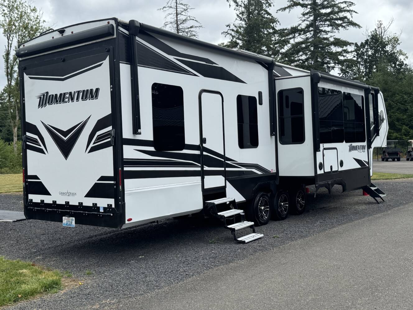 A photo of this 2023 Grand Design MOMENTUM M-CLASS 395MS