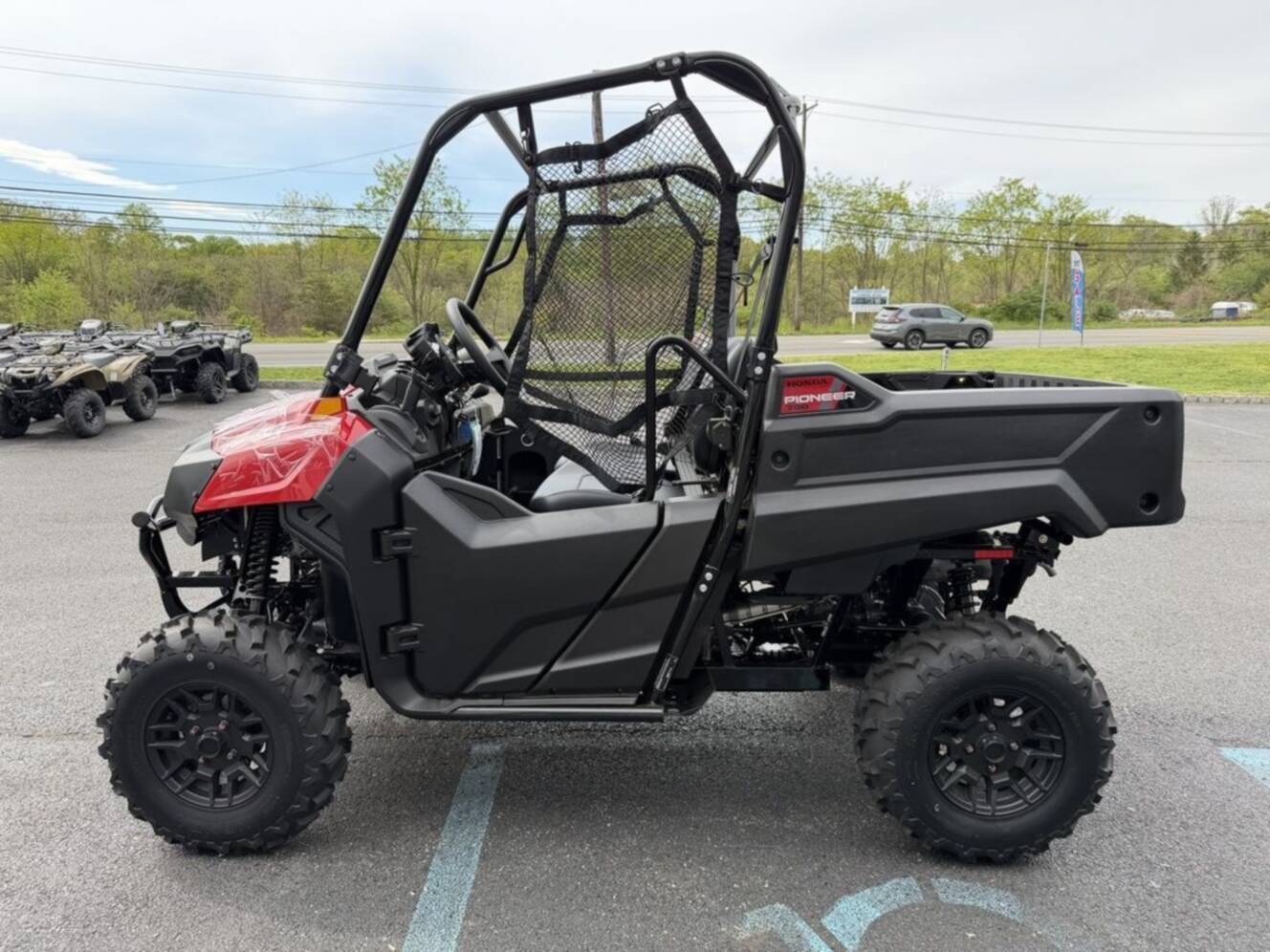 A photo of this 2026 Honda® Pioneer 700 Deluxe