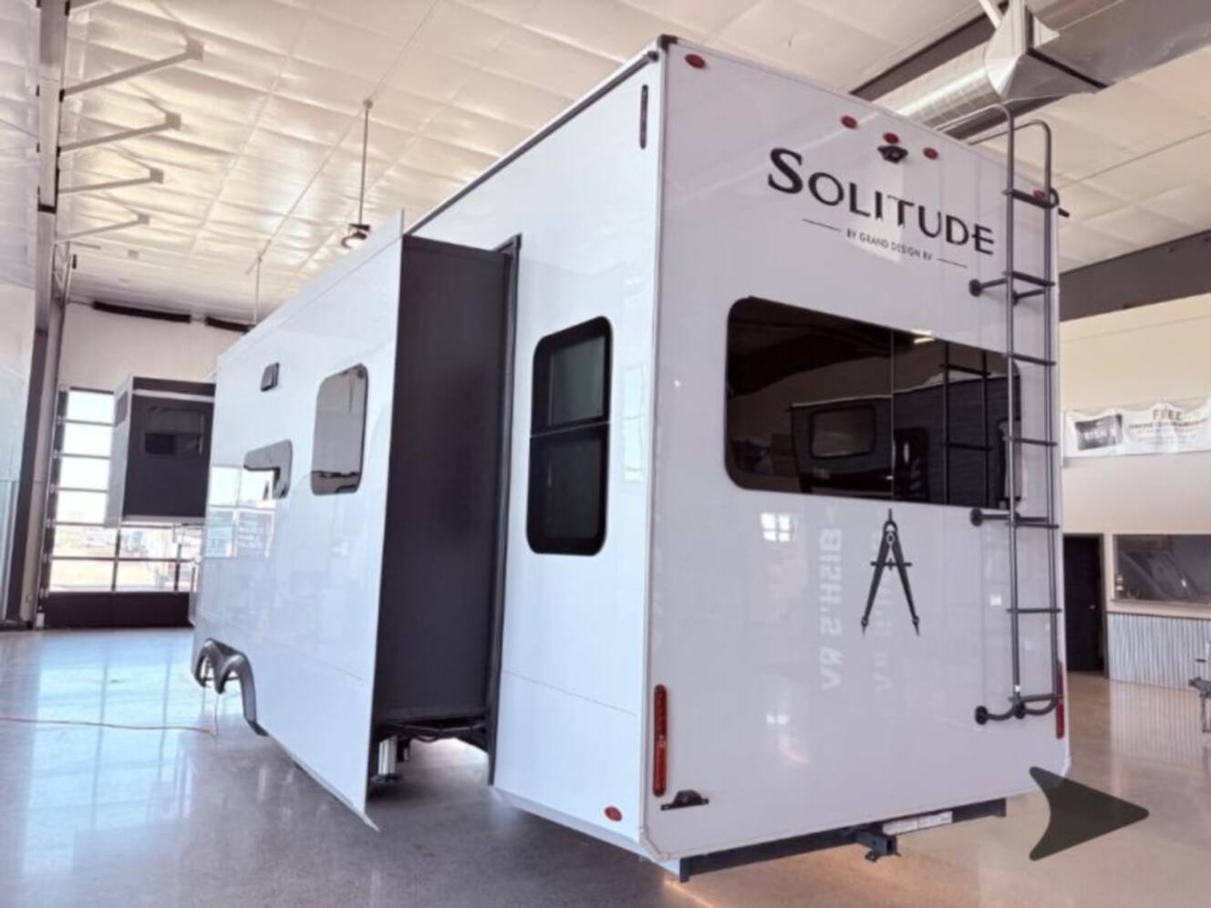 A photo of this 2026 Grand Design Solitude 370DV FULL BODY PAINT - SMOKE