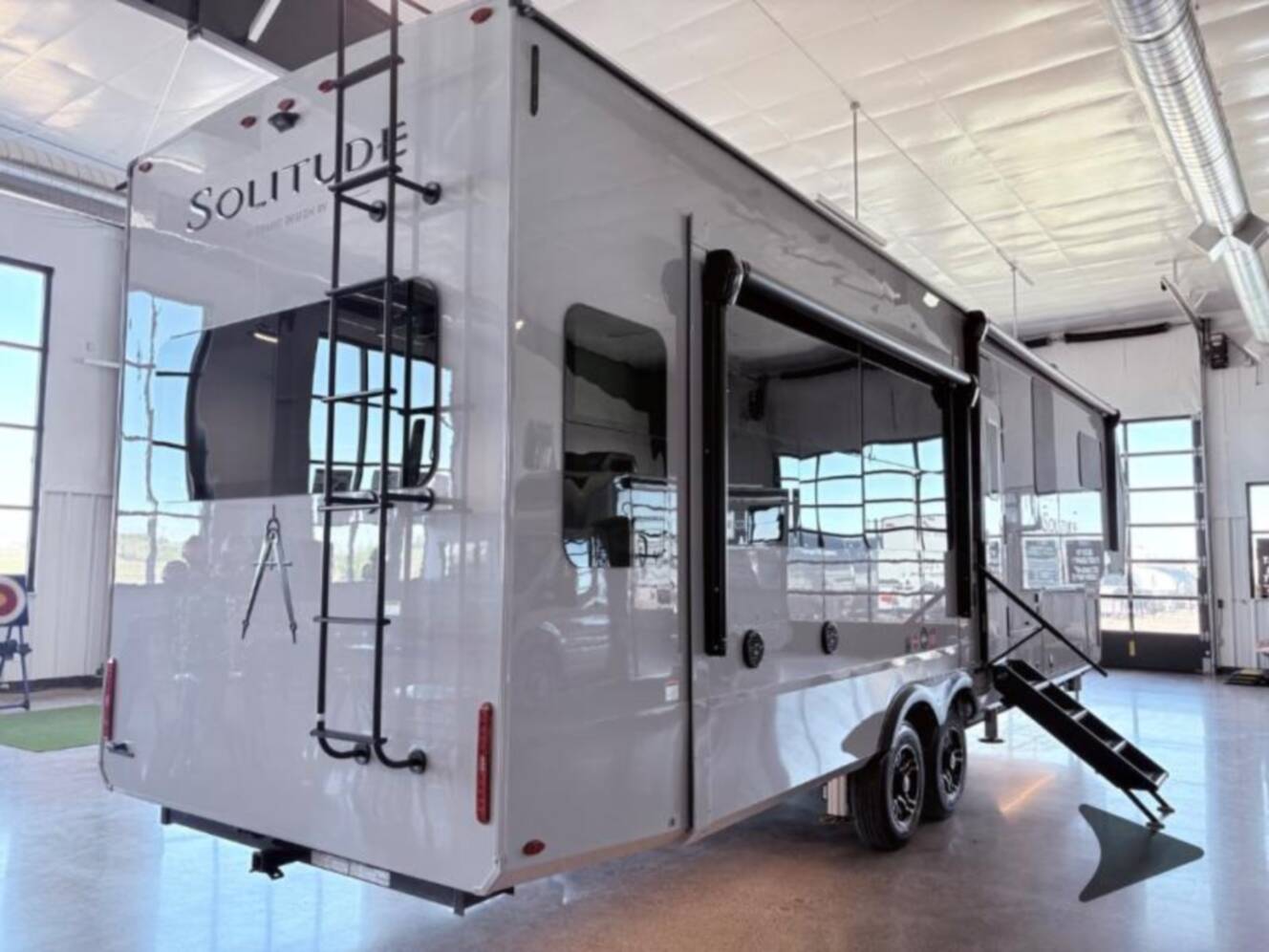 A photo of this 2026 Grand Design Solitude 370DV FULL BODY PAINT - SMOKE