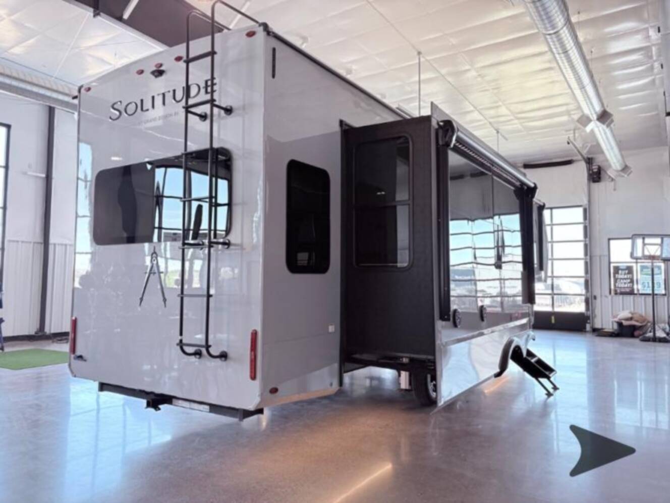 A photo of this 2026 Grand Design Solitude 370DV FULL BODY PAINT - SMOKE