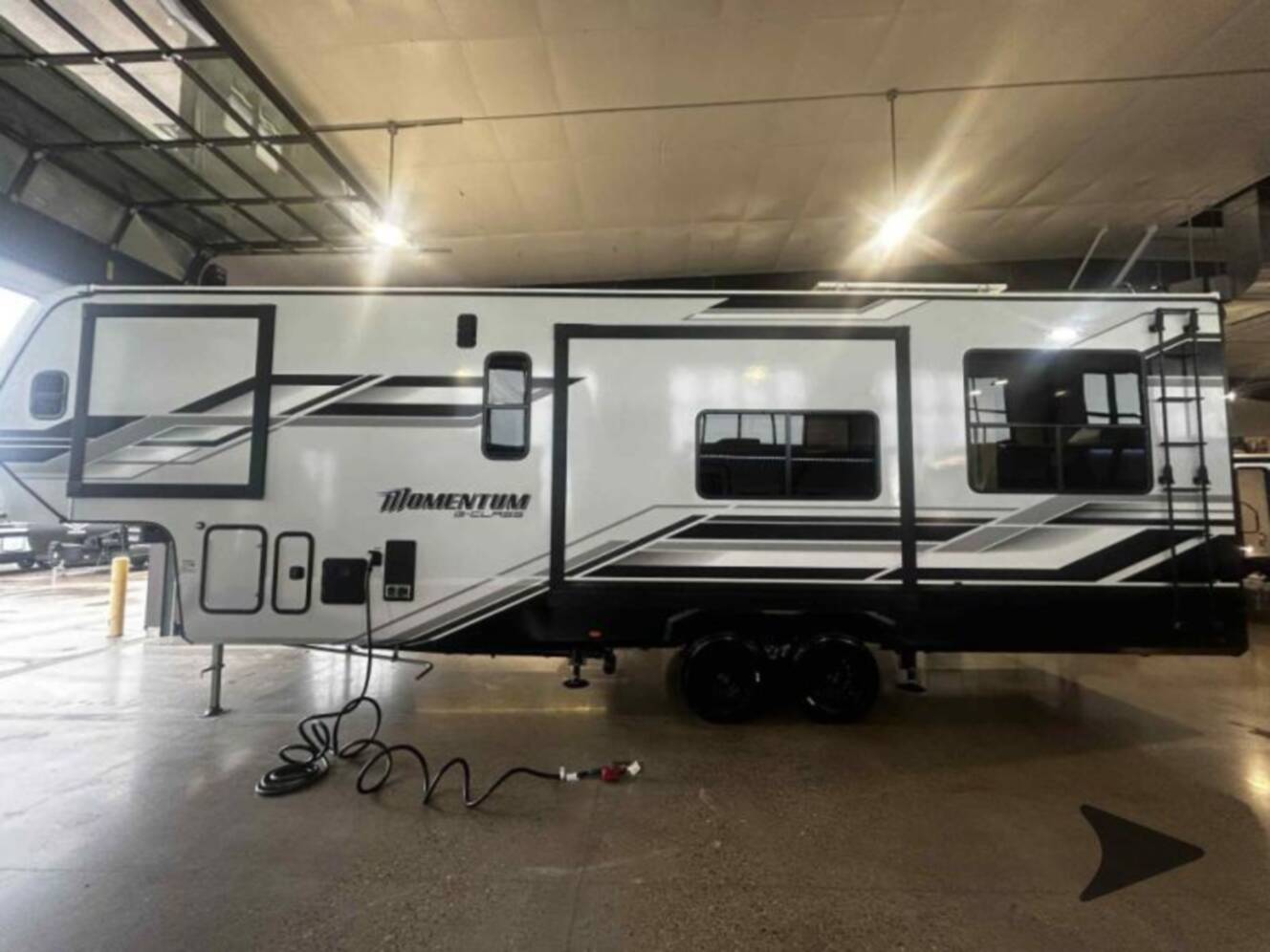 A photo of this 2026 Grand Design Momentum G-Class 325G
