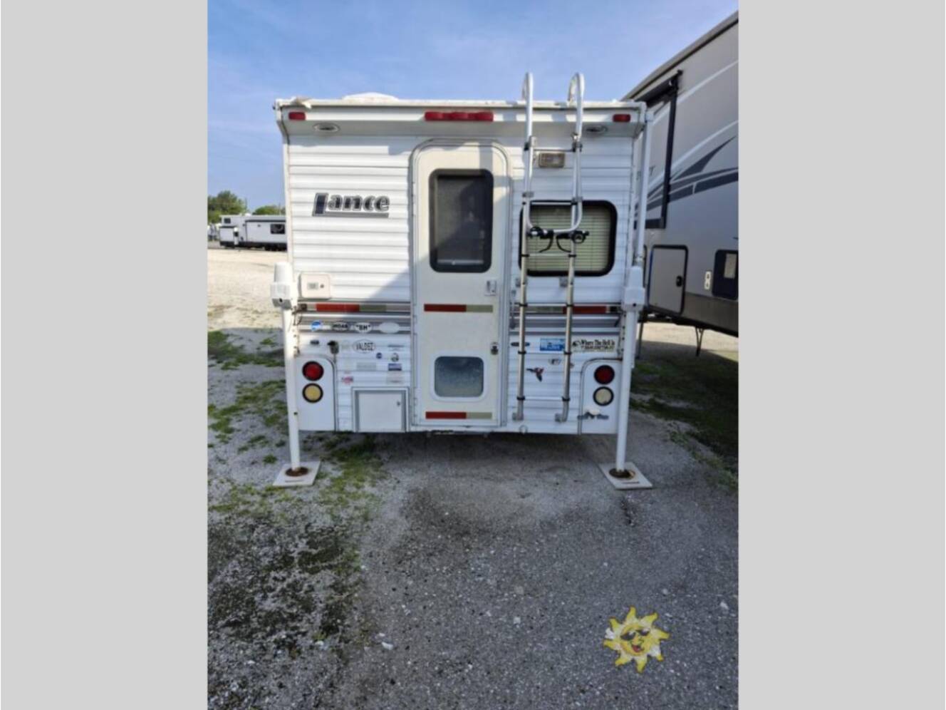 A photo of this 2007 Lance Lance 815 Extended Cabover