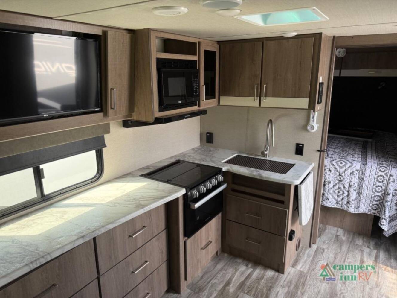A photo of this 2022 Grand Design Imagine XLS 22RBE