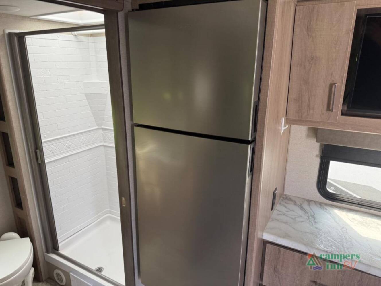 A photo of this 2022 Grand Design Imagine XLS 22RBE