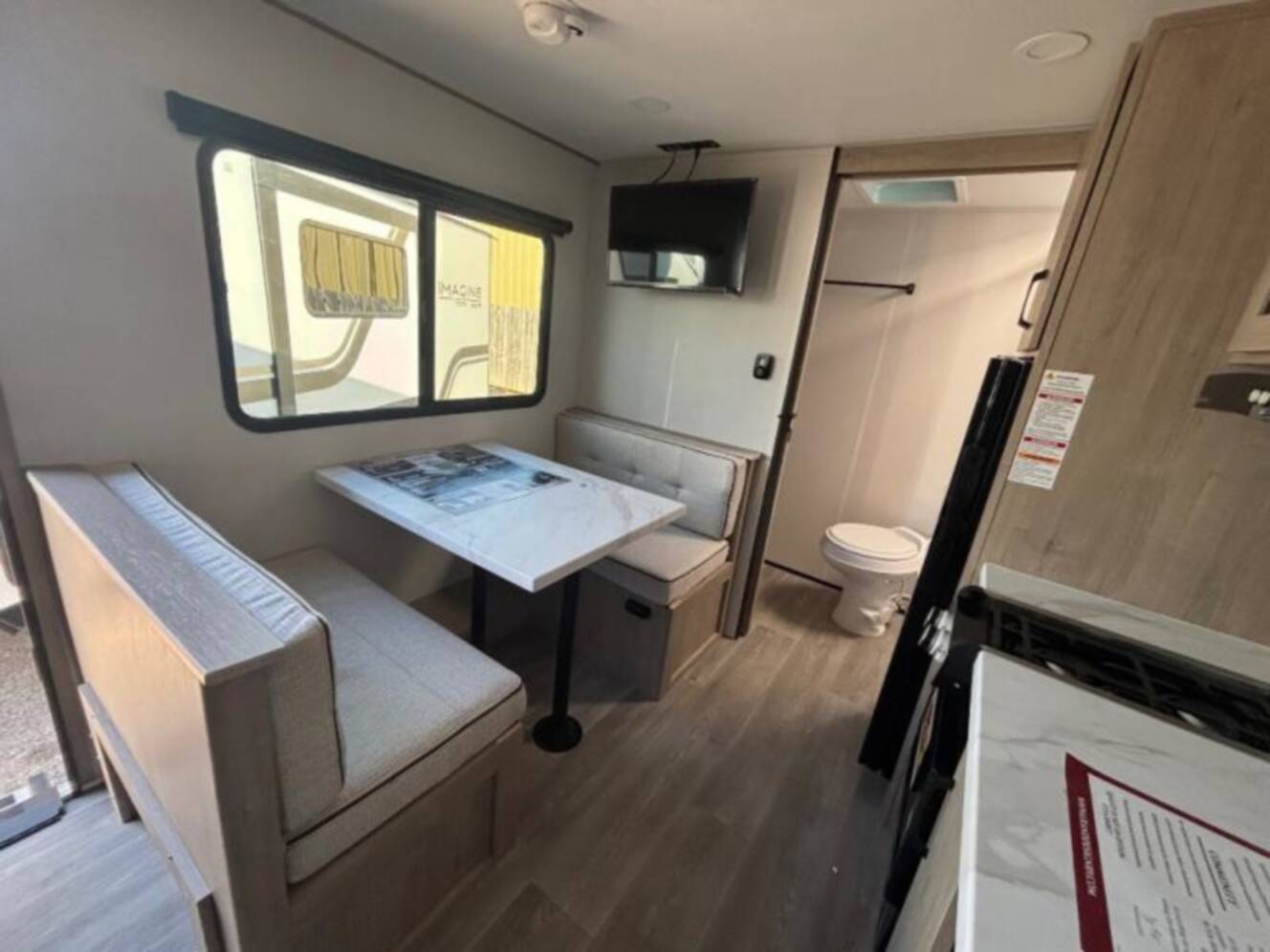 A photo of this 2026 Grand Design Imagine AIM 15RBA