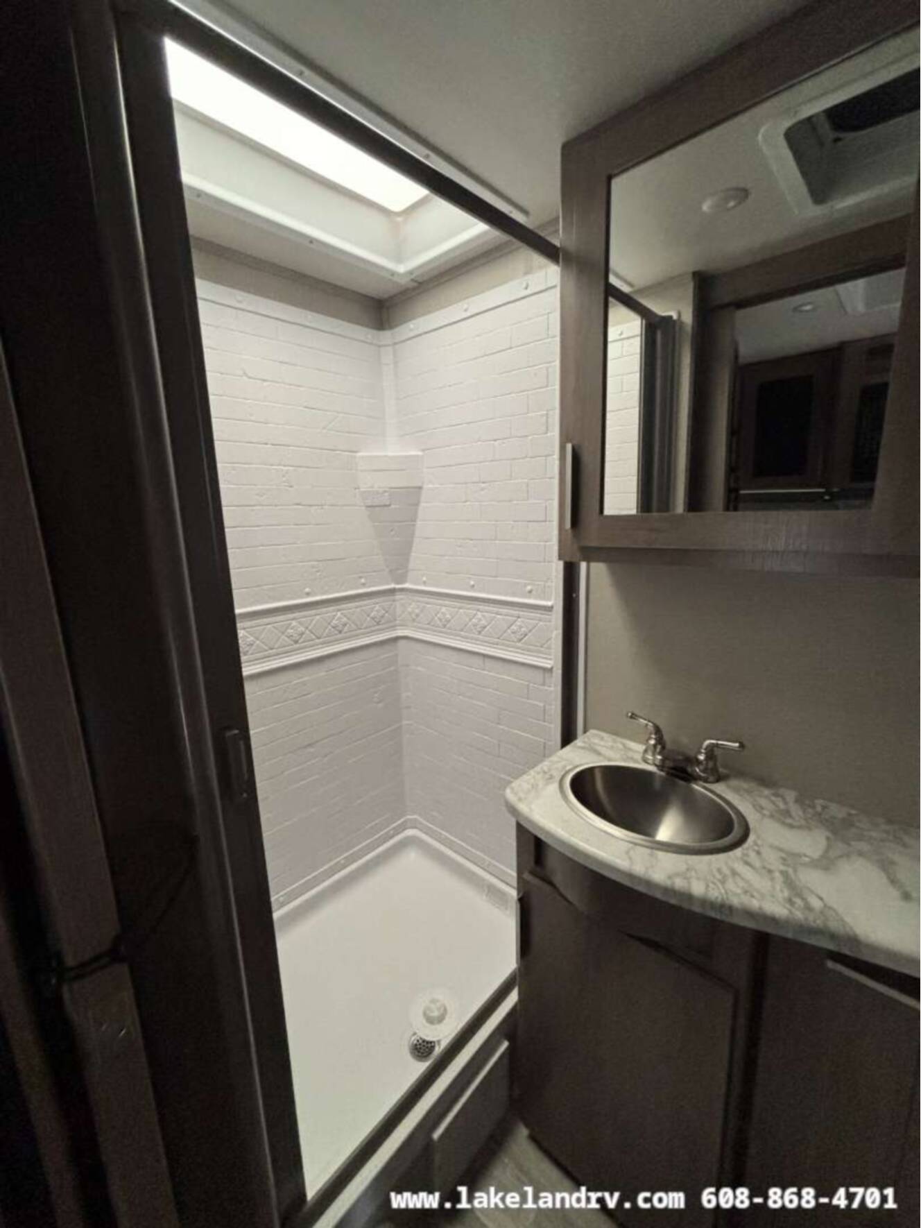 A photo of this 2021 Grand Design Imagine 17MKE