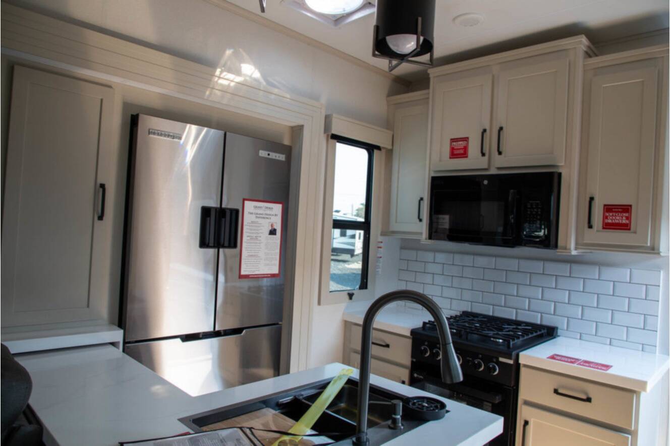 A photo of this 2026 Grand Design MOMENTUM 395MS