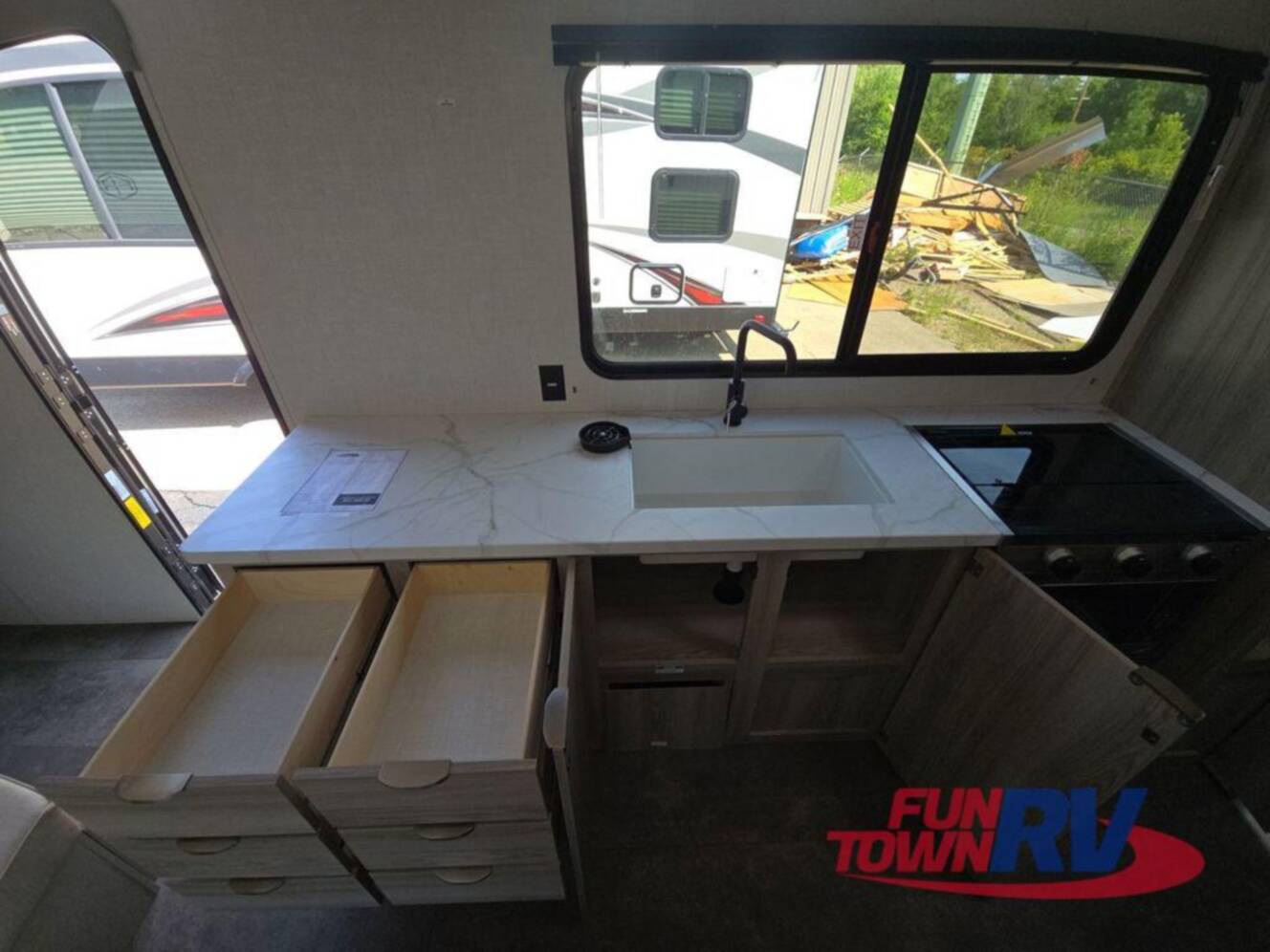 A photo of this 2025 Forest River Rv Wildwood FSX 233RBLE