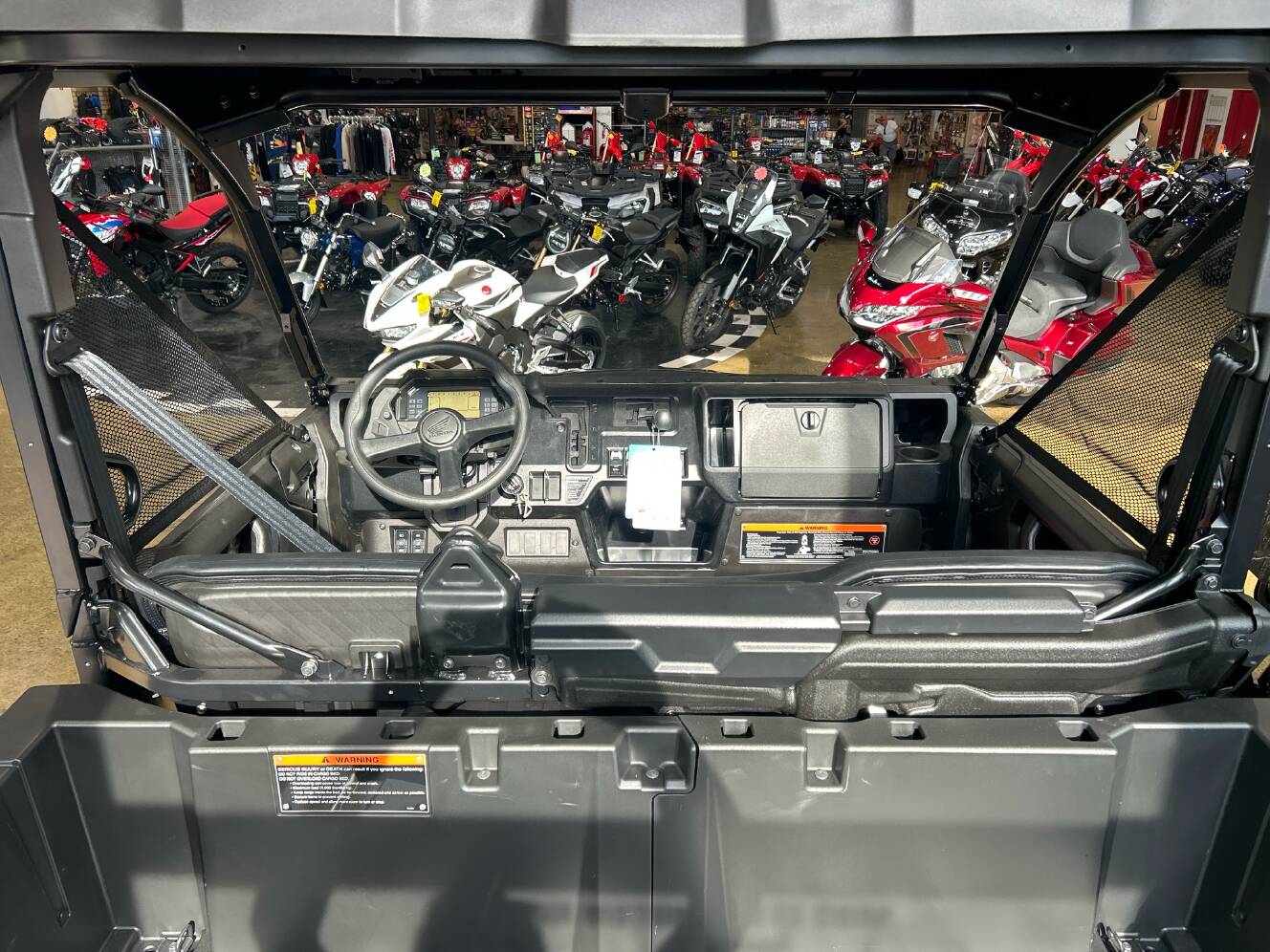 A photo of this 2026 Honda Pioneer 1000 Deluxe