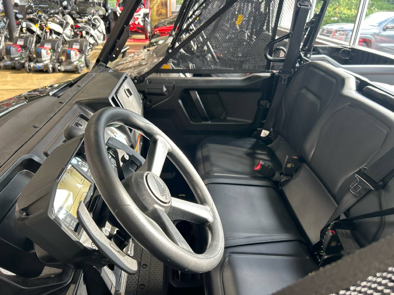 A photo of this 2026 Honda Pioneer 1000 Deluxe