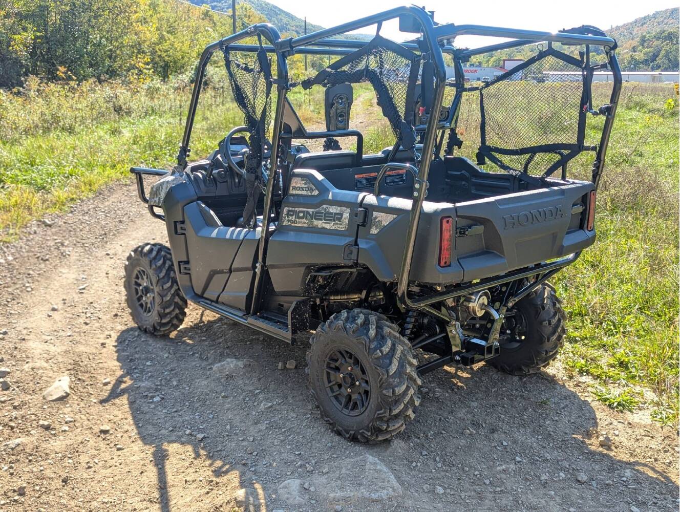 A photo of this 2026 Honda Pioneer 700-4 Forest