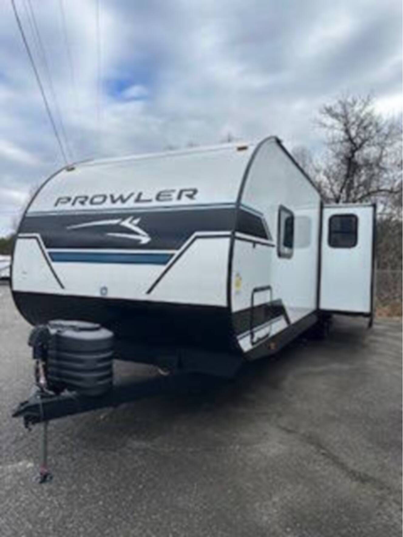 A photo of this 2025 Heartland Prowler 3211 BH