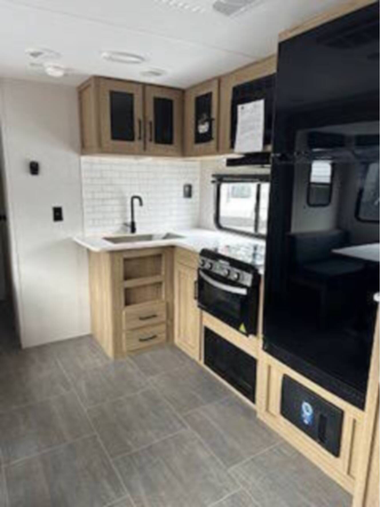 A photo of this 2025 Heartland Prowler 3211 BH