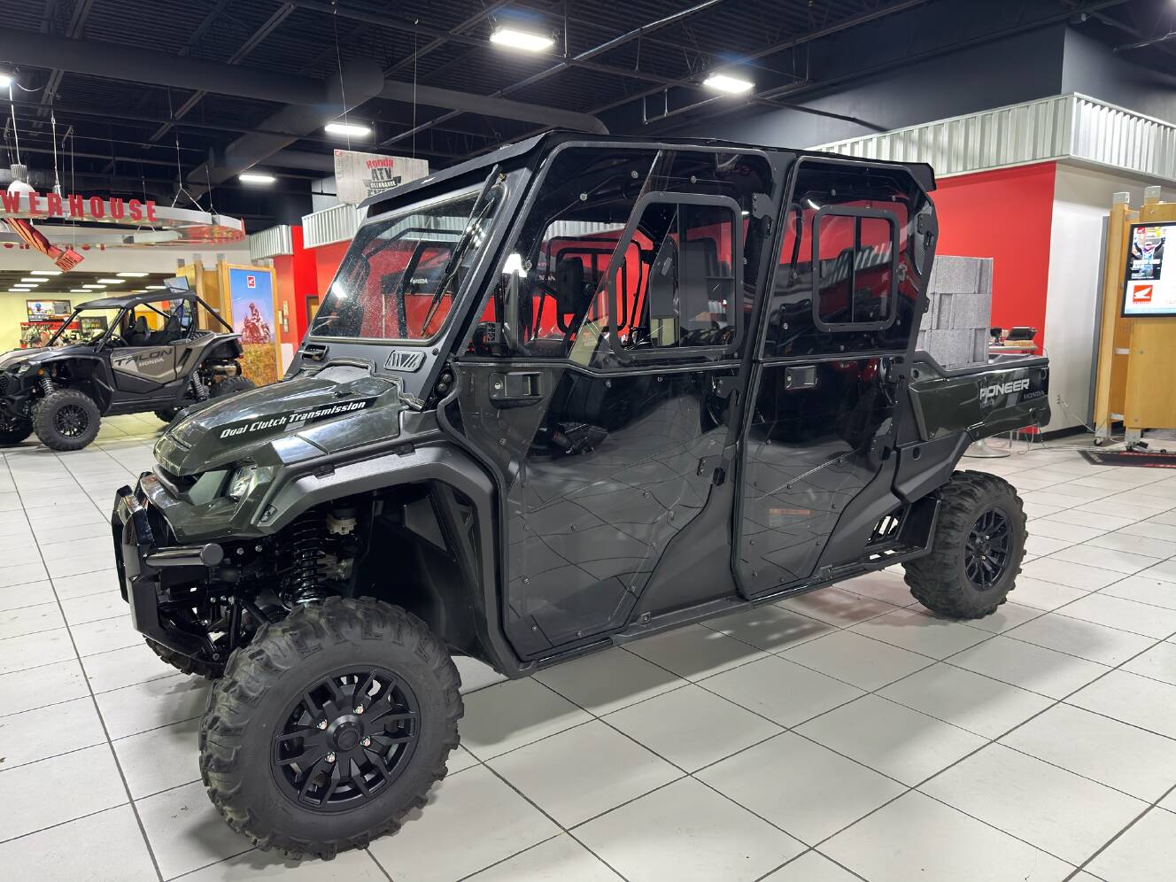 A photo of this 2025 Honda Pioneer 1000-6 Deluxe Crew