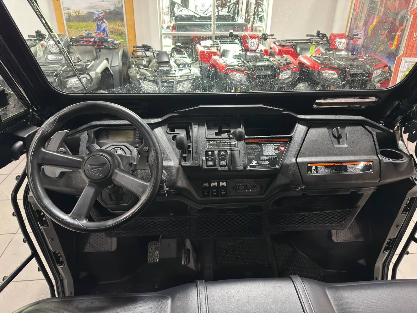 A photo of this 2025 Honda Pioneer 1000-6 Deluxe Crew