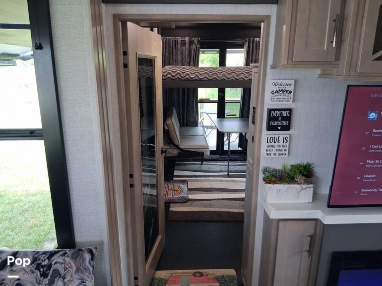 A photo of this 2024 Grand Design Momentum 395MS
