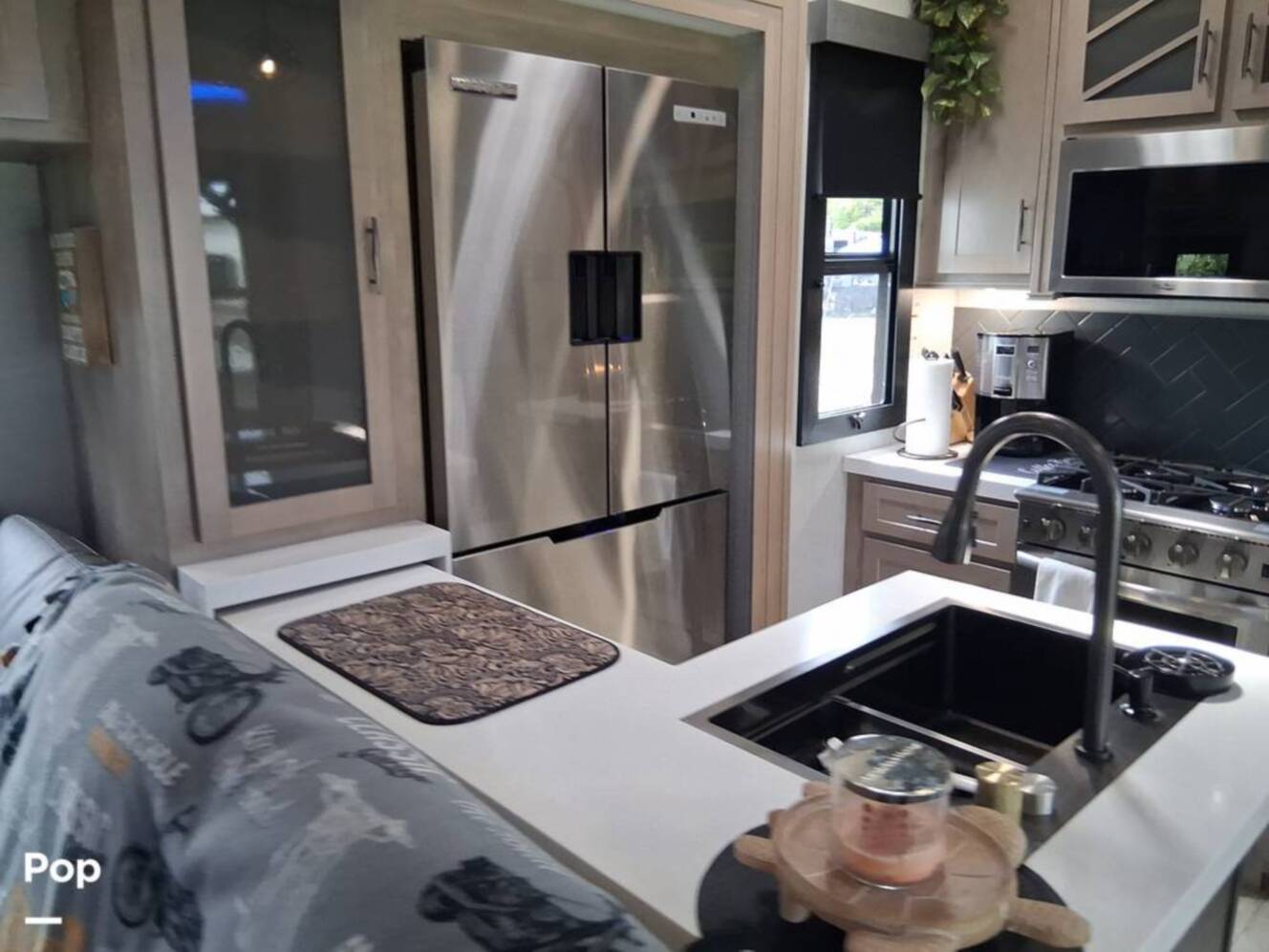 A photo of this 2024 Grand Design Momentum 395MS