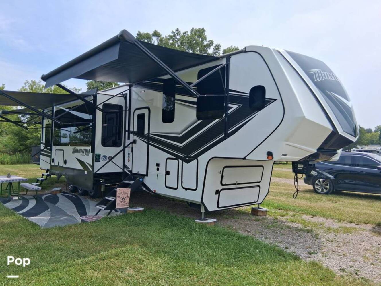 A photo of this 2024 Grand Design Momentum 395MS