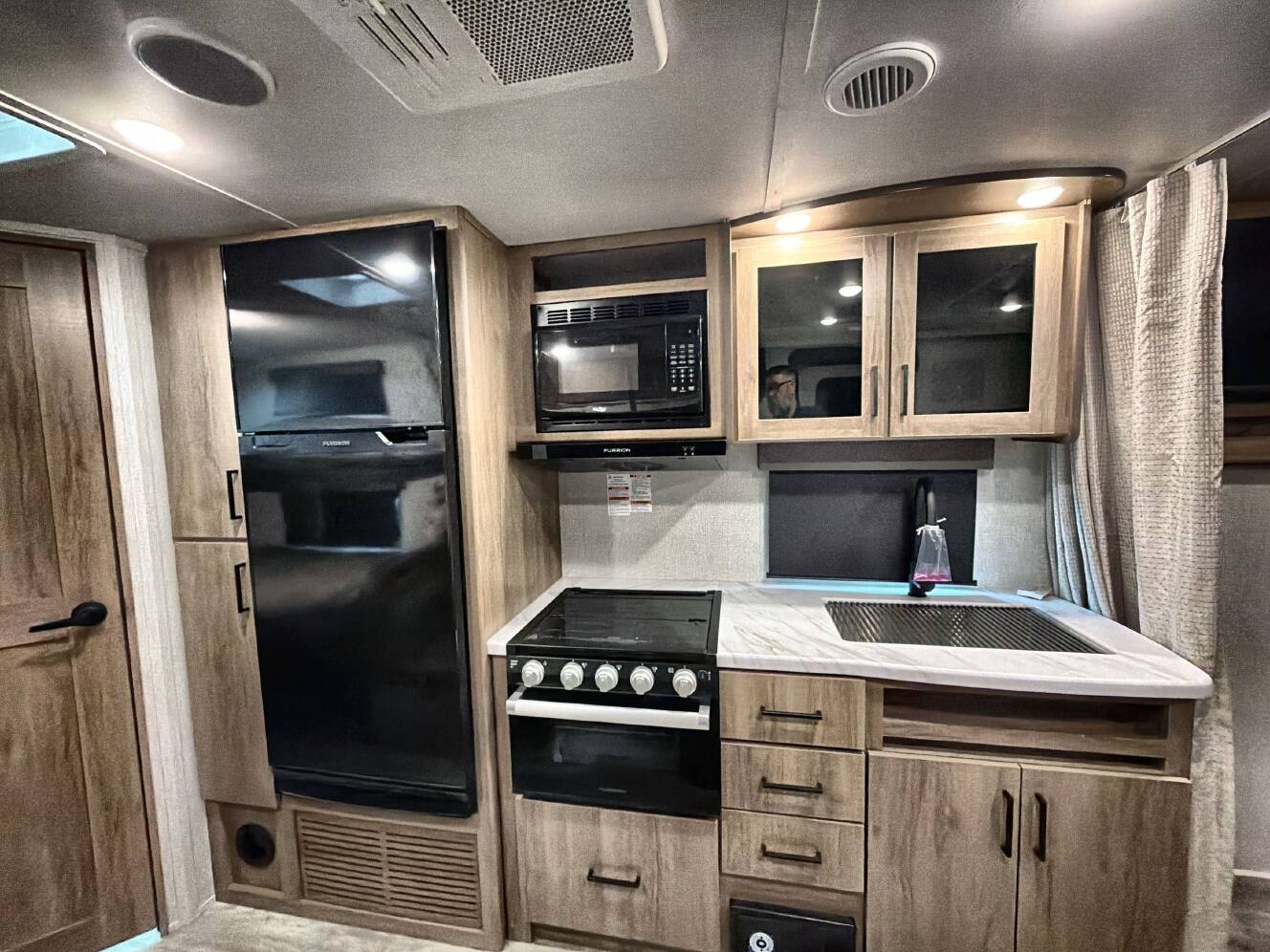 A photo of this 2023 Grand Design IMAGINE XLS 21BHE