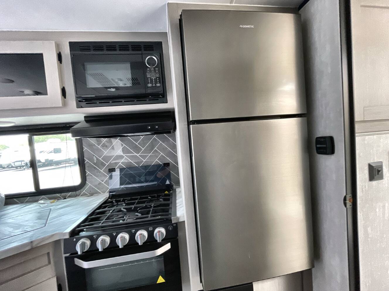 A photo of this 2024 Coachmen APEX ULTRA-LITE 215RBK