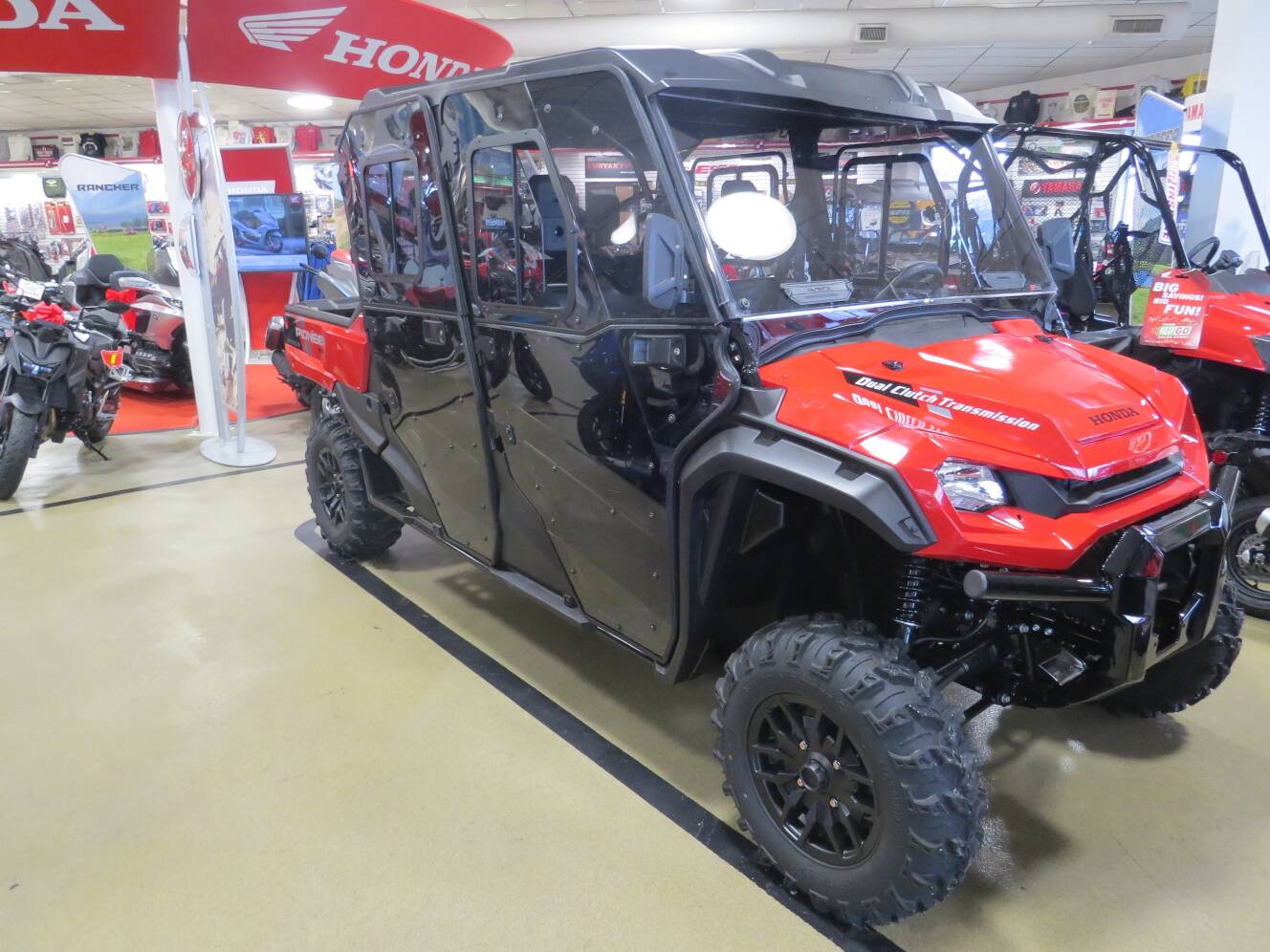 A photo of this 2025 Honda Pioneer 1000-6 Crew Deluxe