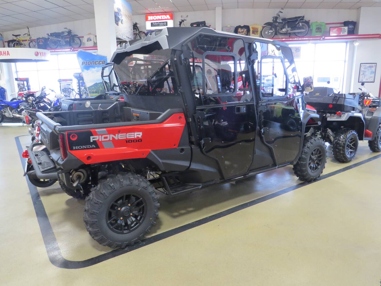 A photo of this 2025 Honda Pioneer 1000-6 Crew Deluxe