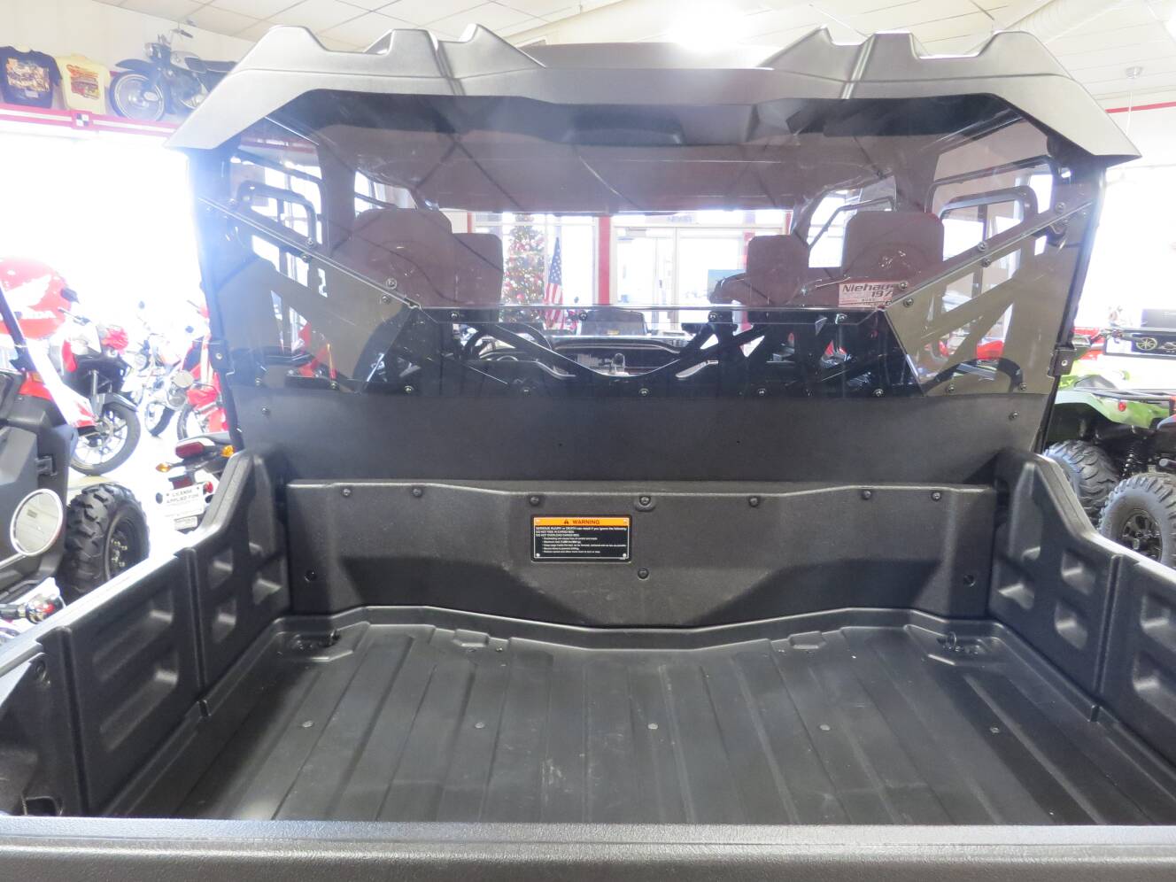 A photo of this 2025 Honda Pioneer 1000-6 Crew Deluxe
