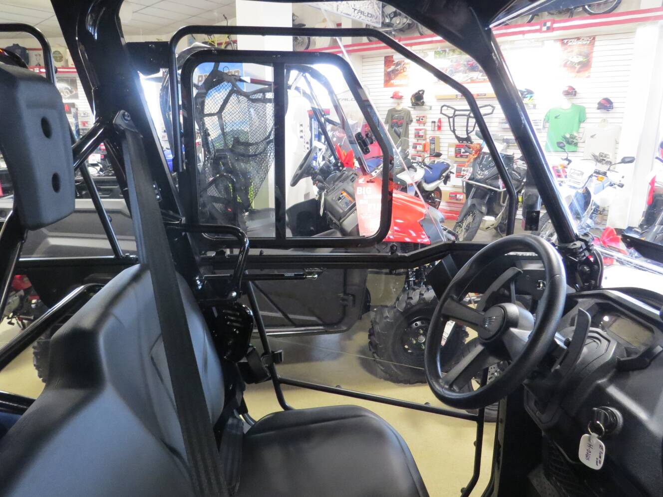 A photo of this 2025 Honda Pioneer 1000-6 Crew Deluxe