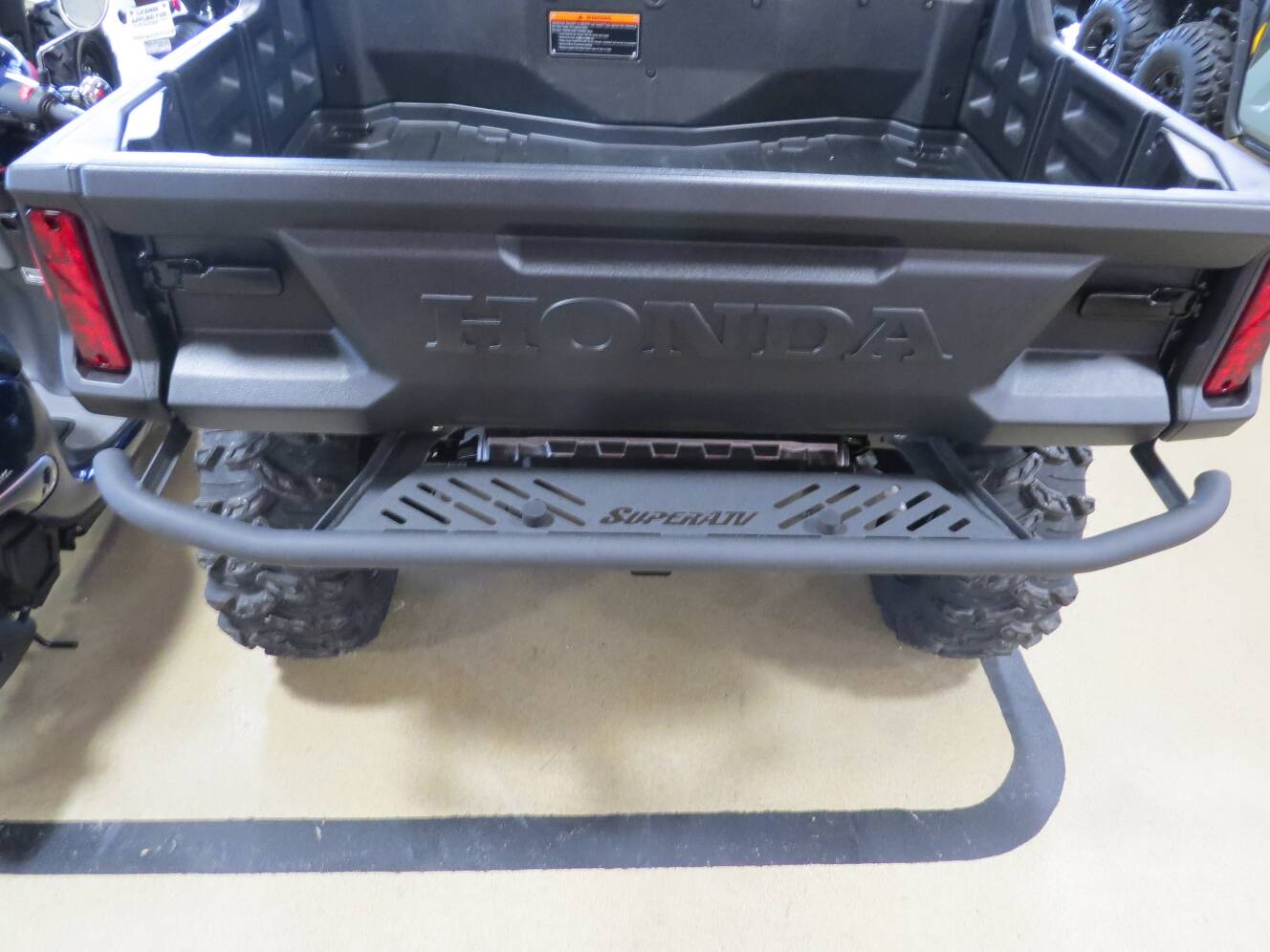 A photo of this 2025 Honda Pioneer 1000-6 Crew Deluxe