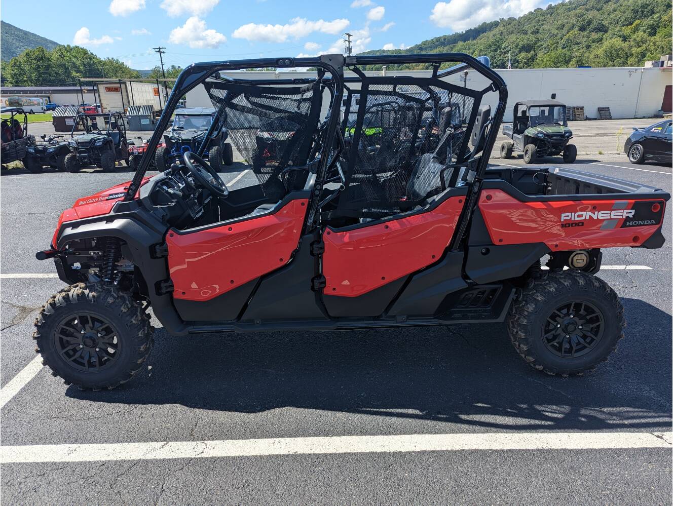 A photo of this 2025 Honda Pioneer 1000-6 Crew Deluxe