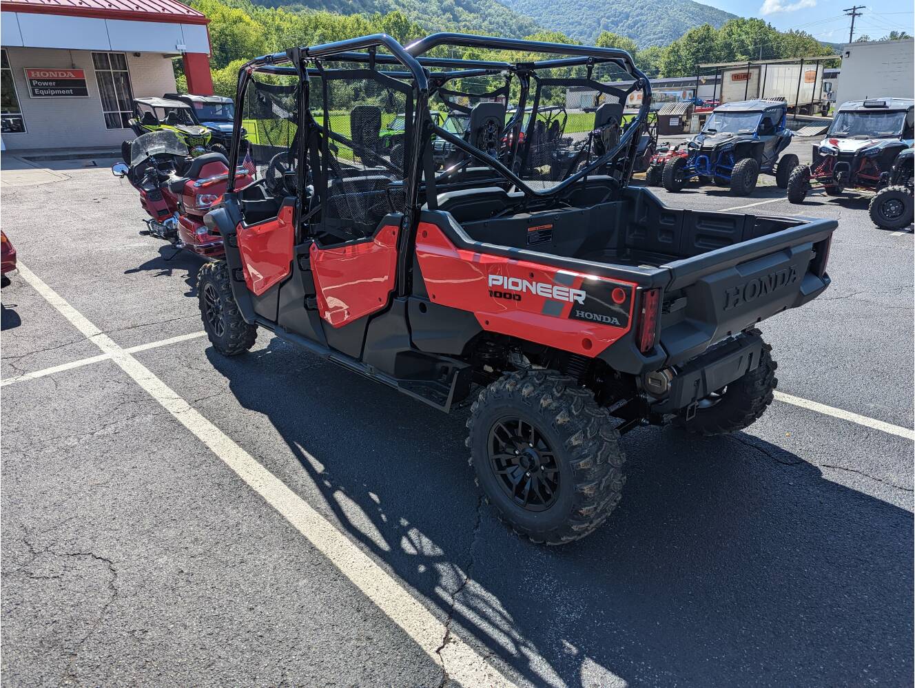 A photo of this 2025 Honda Pioneer 1000-6 Crew Deluxe