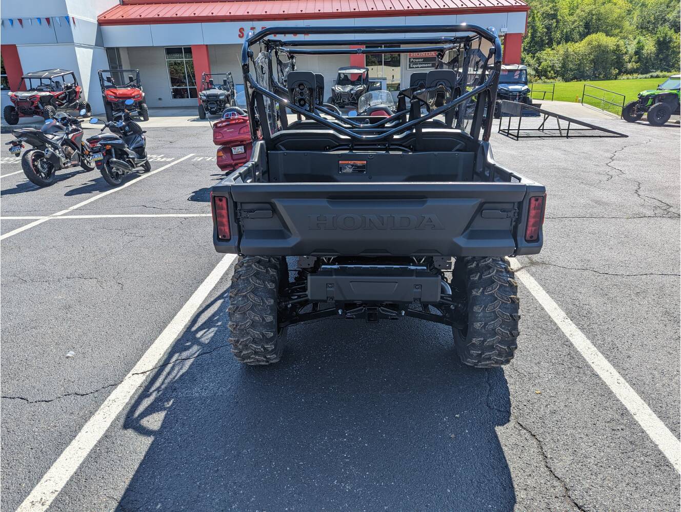A photo of this 2025 Honda Pioneer 1000-6 Crew Deluxe